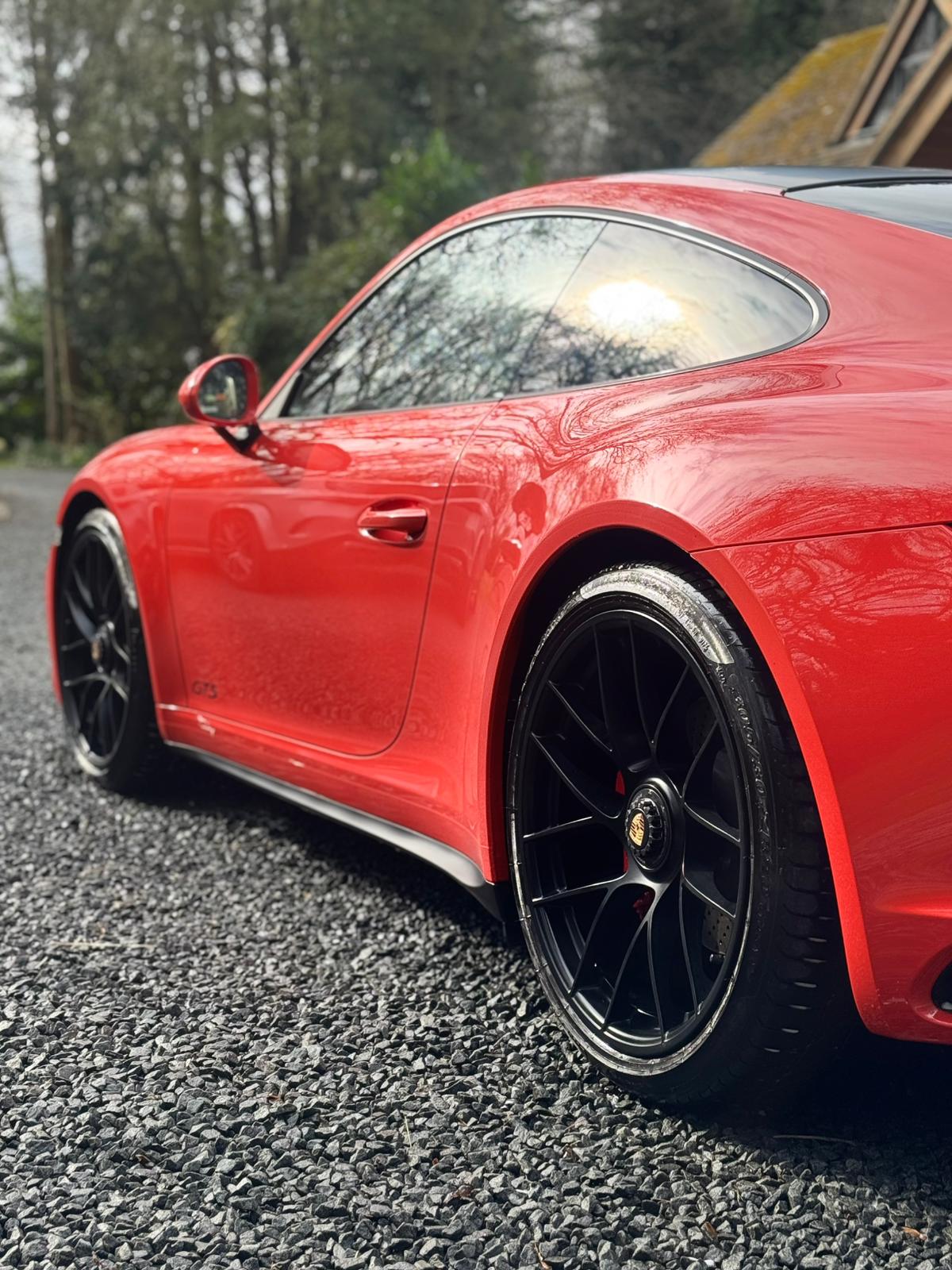Porsche 911 GTS paint correction and machine polishing service
